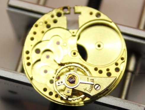 58-Remontage-der-Unruhstoßsicherung-Assembling-of-the-shock-absorbing-system.jpg
